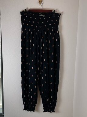 Anthropologie Black Smocked Waist Printed Harem Pants boho hippie size small